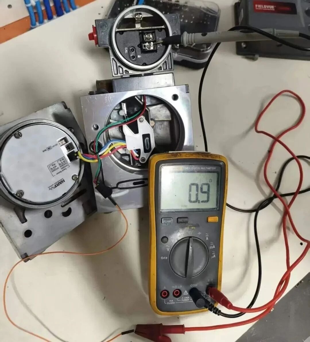 Measuring red wire to Loop+ resistance on Fisher DVC6200 terminal block with multimeter